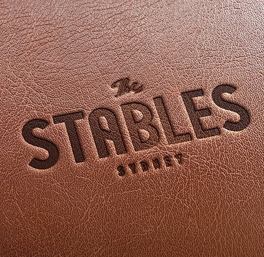 the stables logo design on menu
